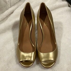 Gold Coach heels